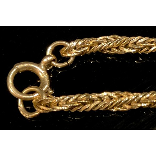 1410 - A long wheat chain necklace, stamped '9c' for 9ct gold, 76cm long, 27.5g