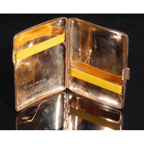 2147 - A 9ct gold curved rectangular cigarette case, vacant circular cartouche, 8.5cm high, 60g