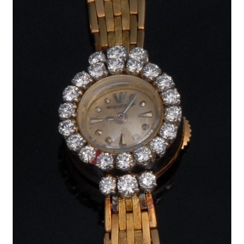 1293 - A ladies diamond set 18ct gold Jaeger-LeCoultre cocktail watch, champagne dial, baton hour markers, ... 