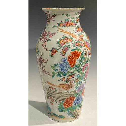 475 - A pair of large Japanese inverted baluster vases, decorated in the Chinese manner with exotic birds ... 