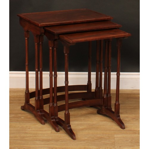 2369 - A Regency style nest of three occasional tables, the largest 61cm high, 49cm wide, 34.5cm deep