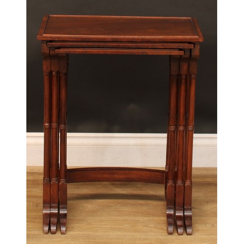 2369 - A Regency style nest of three occasional tables, the largest 61cm high, 49cm wide, 34.5cm deep