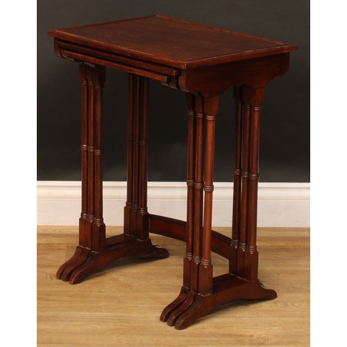 2369 - A Regency style nest of three occasional tables, the largest 61cm high, 49cm wide, 34.5cm deep