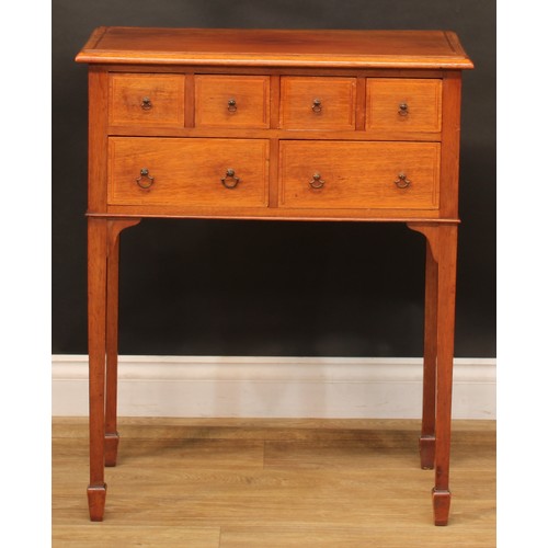 1910 - An early 20th century mahogany lowboy or side table, rectangular top above an arrangement of six dra... 