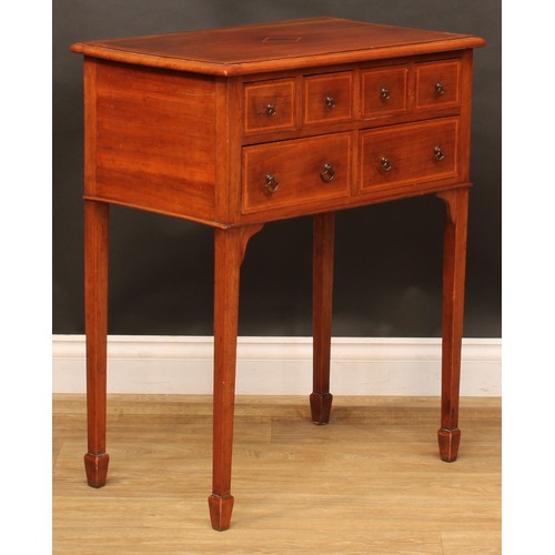 1910 - An early 20th century mahogany lowboy or side table, rectangular top above an arrangement of six dra... 