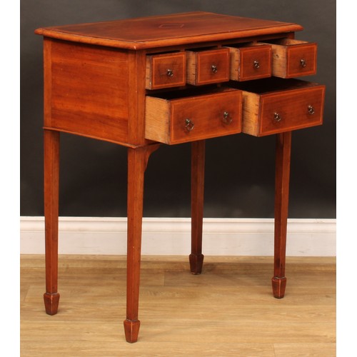 1910 - An early 20th century mahogany lowboy or side table, rectangular top above an arrangement of six dra... 