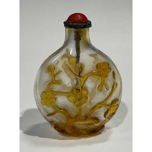 401 - A Chinese Peking glass ovoid snuff bottle, decorated in red overlay with fantail fish against a snow... 