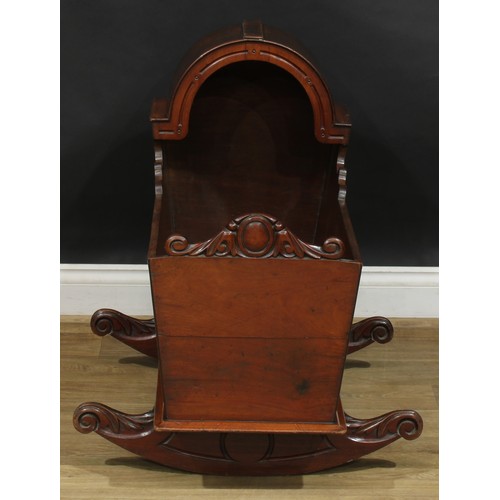 1951 - A late Victorian mahogany canopy top rocking cradle, 74cm high, 93.5cm long, 64.5cm wide, c.1890