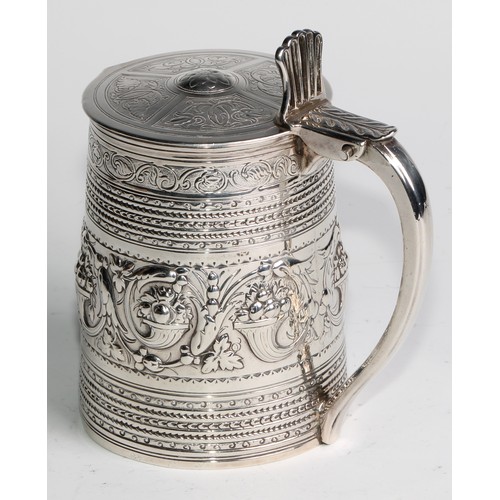 940 - A George III silver spreading cylindrical tankard, hinged slightly domed cover, open-work thumbpiece... 