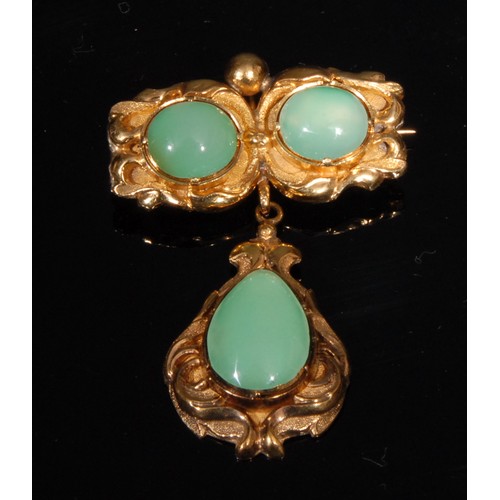 1345 - A composed suite of 18ct and 15ct gold jewellery set with polished jade , comprising, an 18ct gold r... 