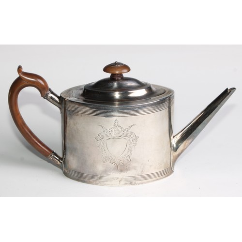 931 - A George III silver oval drum shaped teapot, bright-cut and wrigglework engraved with bands and vaca... 