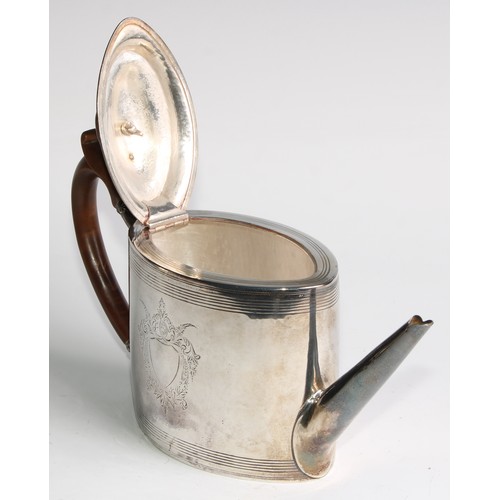 931 - A George III silver oval drum shaped teapot, bright-cut and wrigglework engraved with bands and vaca... 