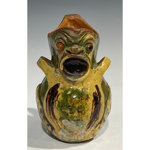 93 - A late 19th century terracotta grotesque jug, by Blanche Vulliamy, modelled as an amphibious style c... 