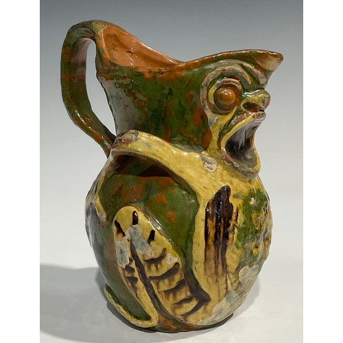 93 - A late 19th century terracotta grotesque jug, by Blanche Vulliamy, modelled as an amphibious style c... 