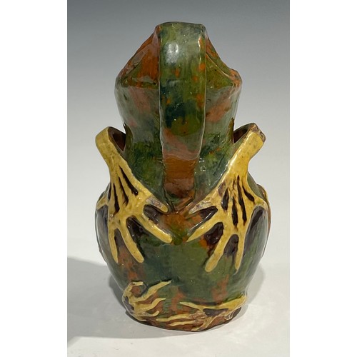 93 - A late 19th century terracotta grotesque jug, by Blanche Vulliamy, modelled as an amphibious style c... 