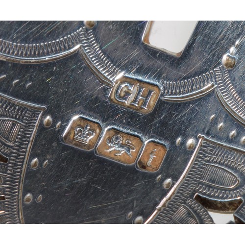 793 - A pair of late Victorian silver country house fish servers, pierced and wriggle-work engraved blades... 