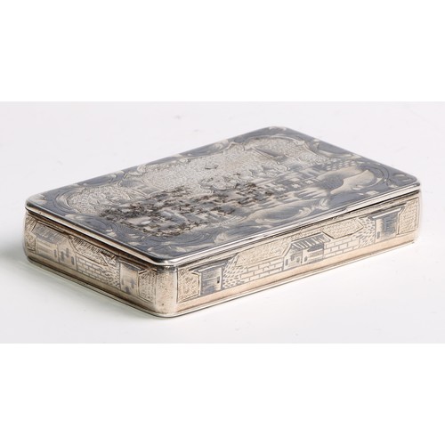 1046 - A Russian silver and niello rounded rectangular snuff box, profusely decorated with architectural vi... 