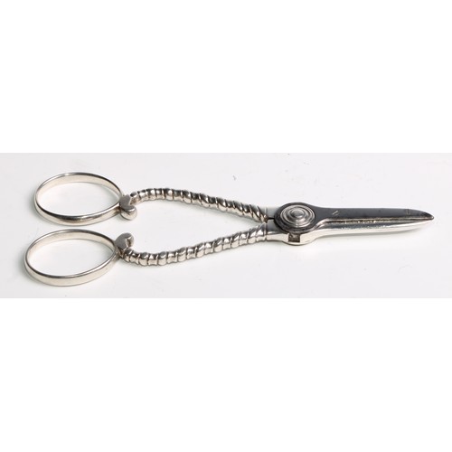 1009 - A pair of American Sterling silver grape scissors, 15cm long