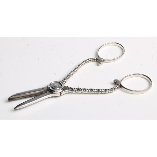 1009 - A pair of American Sterling silver grape scissors, 15cm long