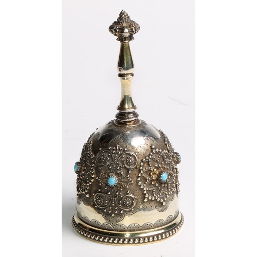 852 - A 19th century French Renaissance Revival silver-gilt table bell, applied with medallions and set wi... 