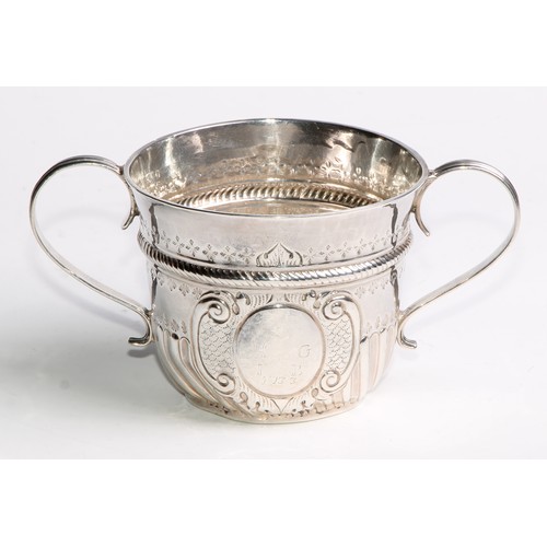 1041 - A Queen Anne silver porringer, reeded scroll handles, 14.5cm wide, Robert Cooper, London 1708, 102g