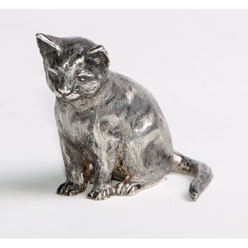 1205 - Garrard & Co - an Elizabeth II cast silver model, of a cat, seated, 4.5cm high, London 1976, 100g