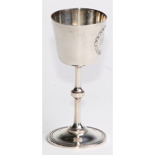 1108 - A Victorian silver three piece travelling Communion set, comprising chalice, paten and flagon, each ... 