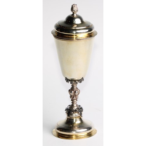 1120 - An 18th century Russian silver-gilt pedestal cup and cover, acanthus bud finial, lobed knop, domed f... 