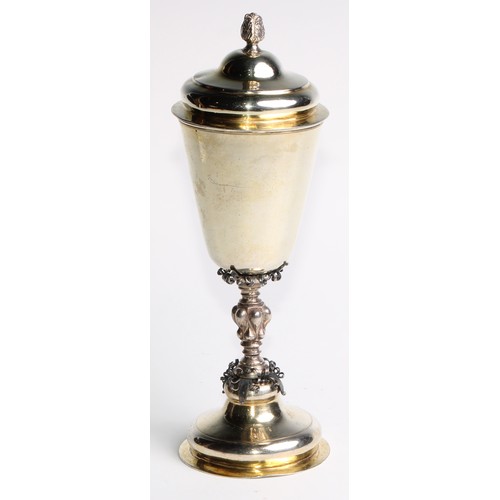 1120 - An 18th century Russian silver-gilt pedestal cup and cover, acanthus bud finial, lobed knop, domed f... 