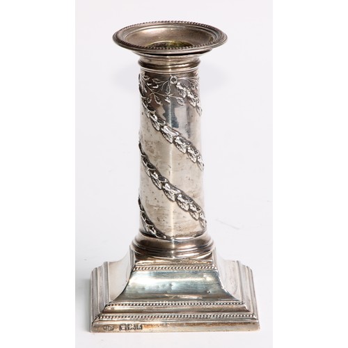 1034 - A pair of Victorian silver columnar candlesticks, in the Neo-Classical taste, beaded borders, steppe... 