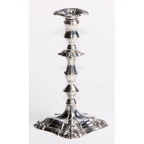 1039 - A pair of William IV silver tapersticks, detachable nozzles, knopped pillars, fluted square bases, s... 