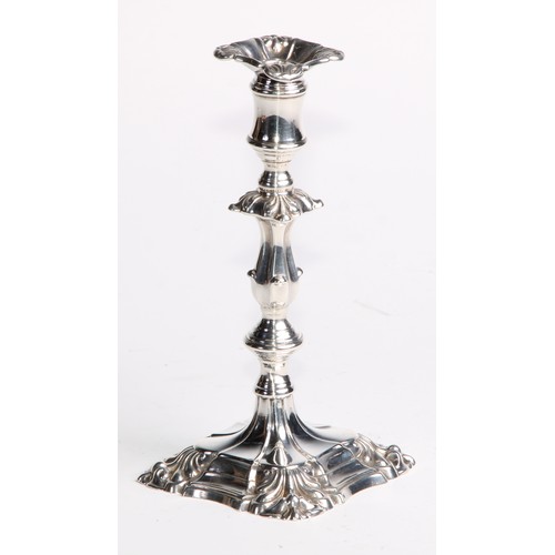 1039 - A pair of William IV silver tapersticks, detachable nozzles, knopped pillars, fluted square bases, s... 