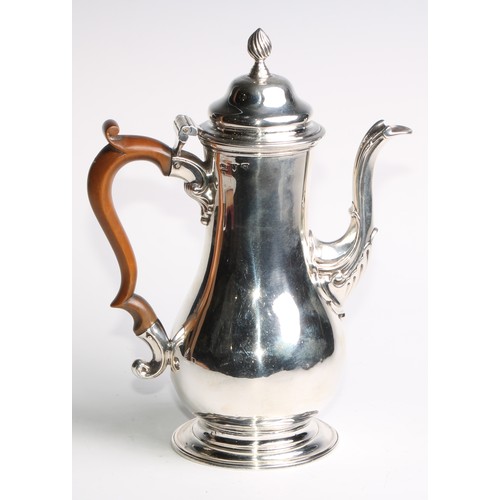 1149 - An early George III silver baluster pedestal coffee pot, hinged domed cover with spiral knop finial,... 