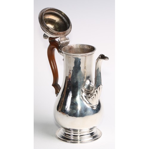 1149 - An early George III silver baluster pedestal coffee pot, hinged domed cover with spiral knop finial,... 