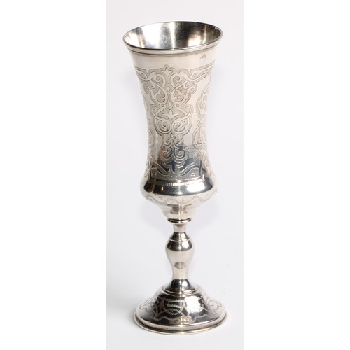 854 - A 19th century Russian silver slender bell shaped pedestal kiddush cup, engraved with strapwork and ... 