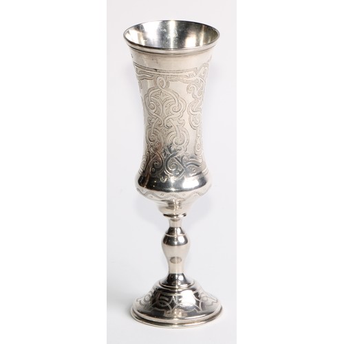 854 - A 19th century Russian silver slender bell shaped pedestal kiddush cup, engraved with strapwork and ... 