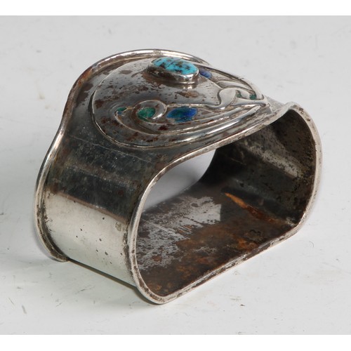 1140 - An Arts and Crafts silver, enamel and turquoise napkin ring, 5cm wide, maker *H, Birmingham 1905