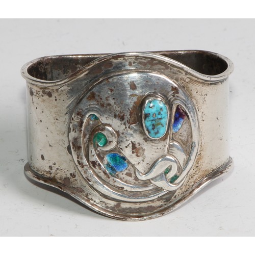 1140 - An Arts and Crafts silver, enamel and turquoise napkin ring, 5cm wide, maker *H, Birmingham 1905