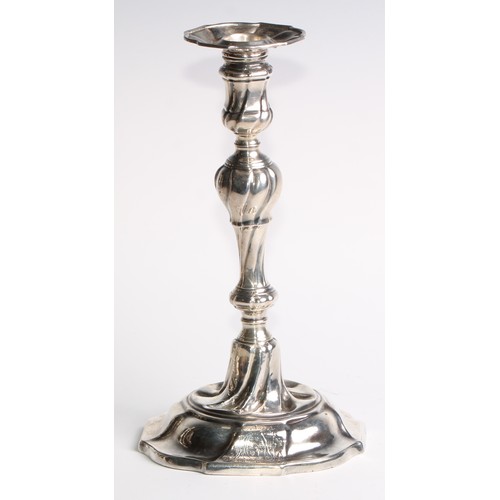 1055 - A set of four George II silver table candlesticks, wrythen pillars, piecrust nozzles and bases, 26.5... 