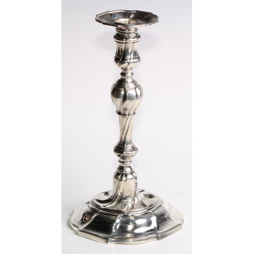 1055 - A set of four George II silver table candlesticks, wrythen pillars, piecrust nozzles and bases, 26.5... 