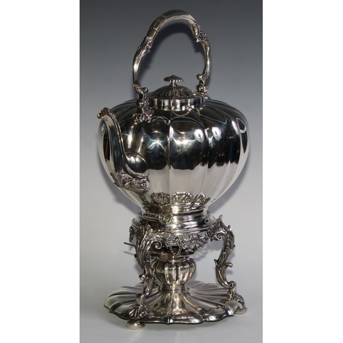 991 - A large early Victorian Rococo Revival silver melon shaped tea kettle, stand and burner, swing handl... 