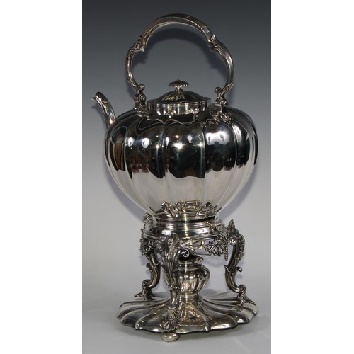 991 - A large early Victorian Rococo Revival silver melon shaped tea kettle, stand and burner, swing handl... 