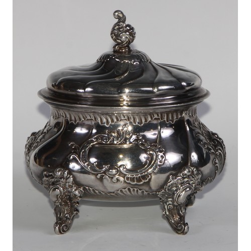 1214 - Judaica - a 19th century silver wrythen-fluted oval etrog box, hinged cover, applied with Rococo car... 