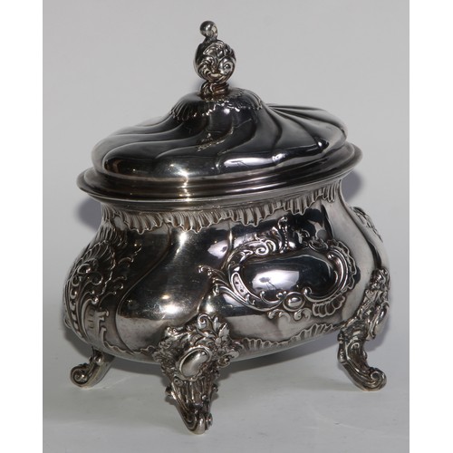 1214 - Judaica - a 19th century silver wrythen-fluted oval etrog box, hinged cover, applied with Rococo car... 