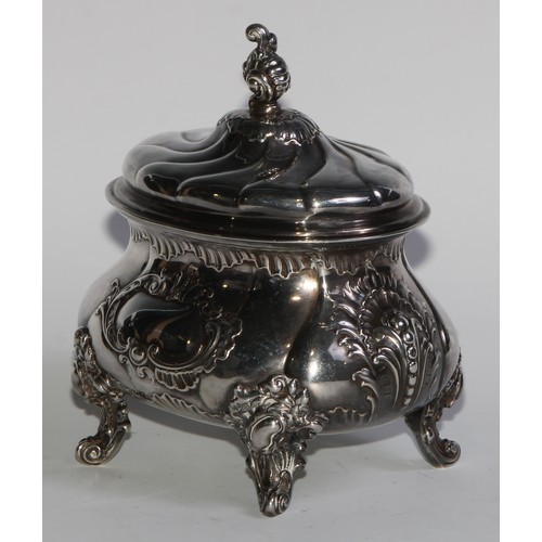 1214 - Judaica - a 19th century silver wrythen-fluted oval etrog box, hinged cover, applied with Rococo car... 