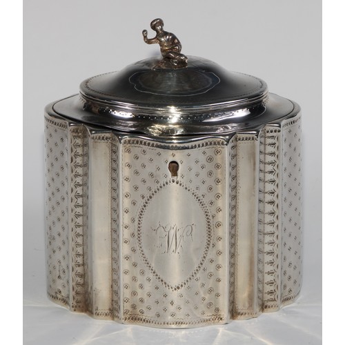 921 - A George III silver commode shaped tea caddy, hingedc domed cover with chinoiserie finial, bright-cu... 