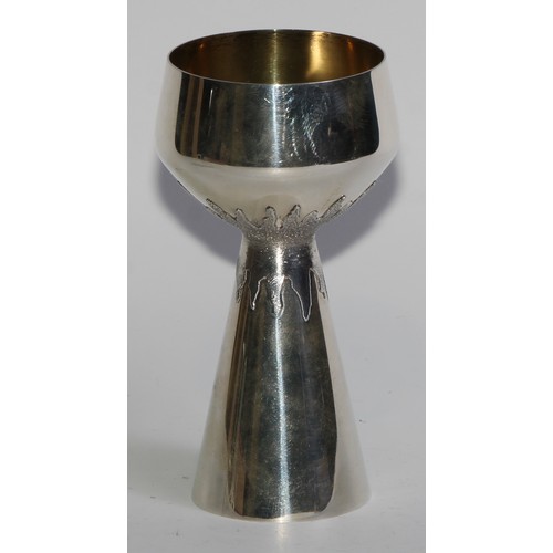 1211 - Grant Macdonald - an Elizabeth II silver pedestal goblet, gilt bowl, splash-textured grip, conical b... 