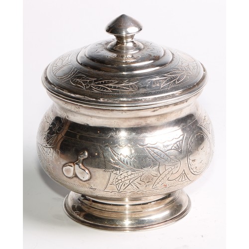 853 - A 19th century Russian silver circular pedestal tea caddy, chased and wrigglework engraved with flow... 