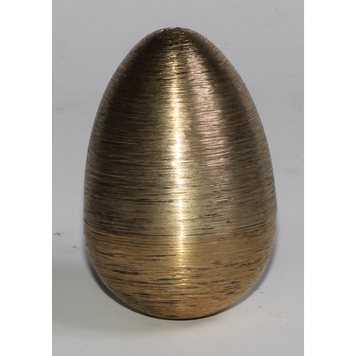 1254 - Stuart Devlin (1931 - 2018) - an Elizabeth II silver-gilt Surprise Egg, Humpty Dumpty, textured over... 