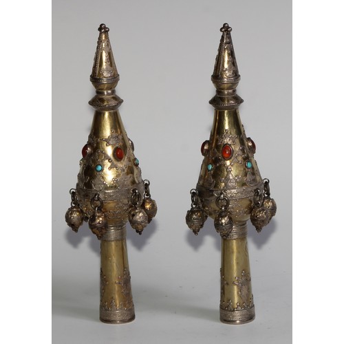 1215 - Judaica - a pair of Jewish silver-gilt rimonim Torah bells, applied with motifs and collet set with ... 